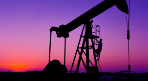 Oil slides on mounting U.S. stockpiles, strong dollar